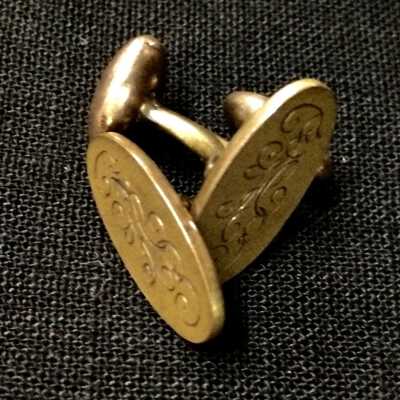 Initialed oval cuff links of Frank H. Priestly, c. early 1900s