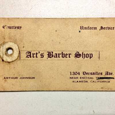 Business card and advertising notebook of Art's Barbershop, prior 2003