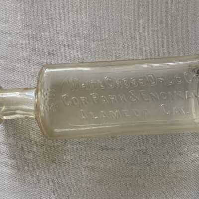 White Cross Drug Company medicine bottle, early 1900s
