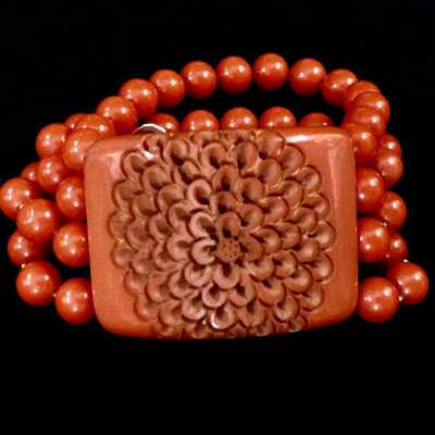 Plastic bracelet on elastic, made to look like coral, c. 1930s