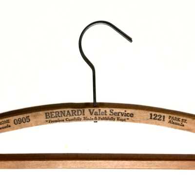 Wooden hanger advertising Bernardi's Dry Cleaning and Valet Service, c. 1920s