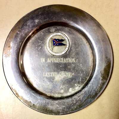 Metal plate presented to Lester Stone, 1958
