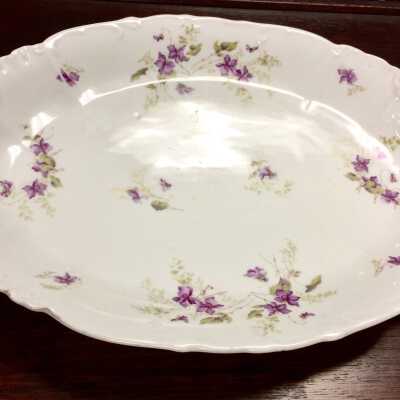 Oval porcelain platter with purple violets, c. 1900s