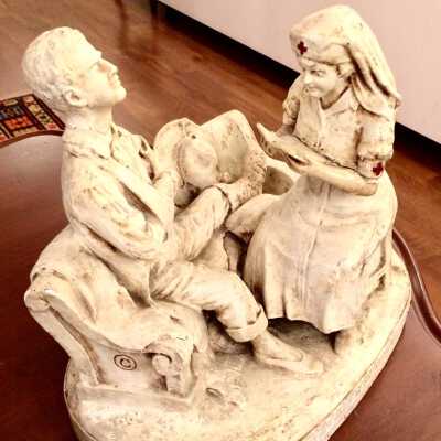 Plaster of Paris statue of a Red Cross nurse and wounded soldier, c. 1918