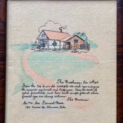 Framed greeting card with a handcolored print depicting a house,