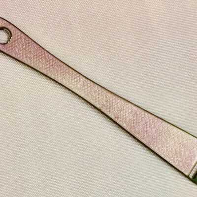Silver ribbon threader with lavender enameling, early 1900s