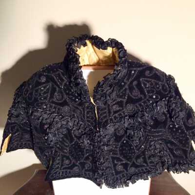 Black velvet half cape with black sequins, jet beads and ruffle, c. 1890s