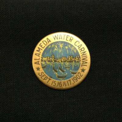 Souvenir pin from the Alameda Water Carival, 1902
