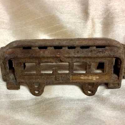 Cast Iron toy train car dug up from yard of 1308 St. Charles Street, c. 1900