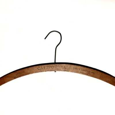 Wooden hanger for California Dyeing and Cleaning Works, c. 1920s