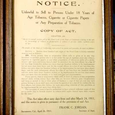 Notice regarding selling tobacco to minors from Frank's Barber Shop, 1930s