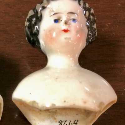 Painted porcelain doll head of Bertha Meyers, c. 1880