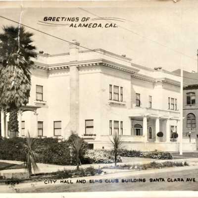 Photo postcard of exterior Elks Club and City Hall, c. 1912