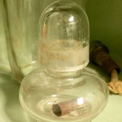 Clear glass fount burner with removable metal burner with wick from Frank's Barber Shop