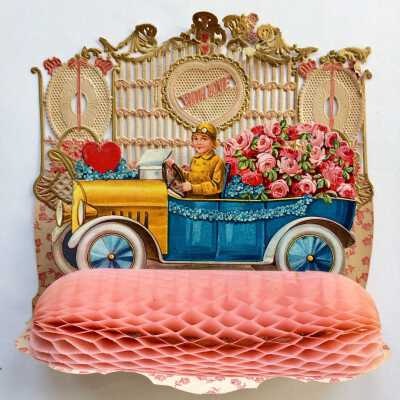 Valentine with open touring car with roses as passengers, c. 1920s