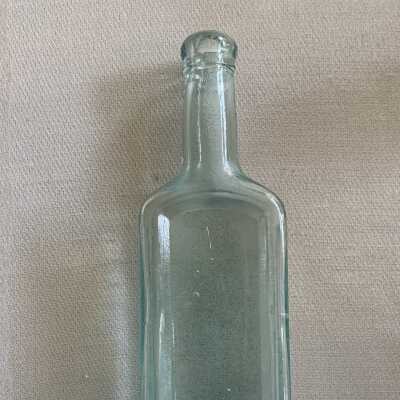 Aqua Castoria medicinal bottle found in the basement of 2008 Clinton Ave, early 1900s