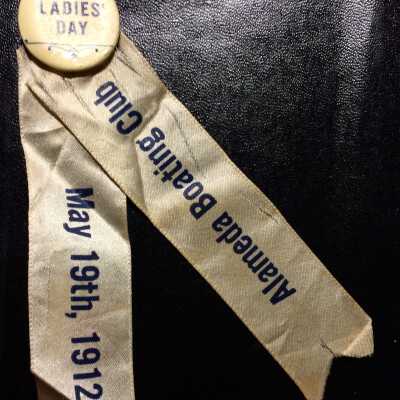 Admittance button Ladies Day Alameda Boating Club, 1912