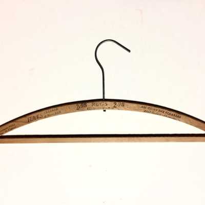 Wooden hanger advertising the American Dry Cleaners, prior 1970