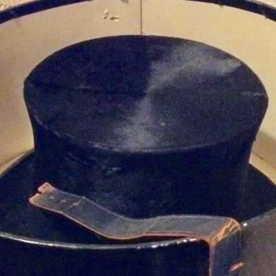 Black Beaver Top hat with brim trimmed in black silk and grosgrain ribbon, c. 1890s