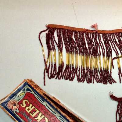 Lampshade trim of garnet and amber glass beads, early 1900s