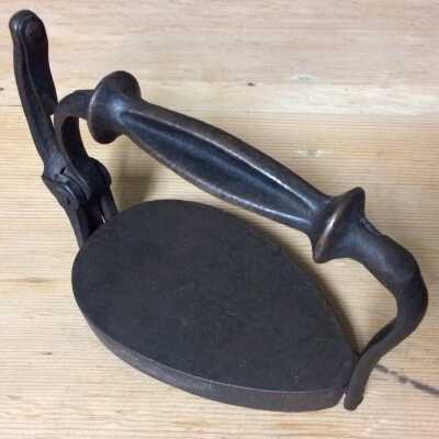 Oval Sad-iron of Mrs. August Pearson, c. 1880-1890