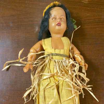 Bisque head Hawaiian Doll with grass skirt