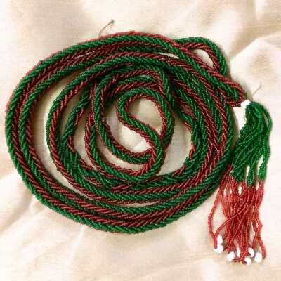 Opera necklace with read and green miniature beads and tassel, early 1900s