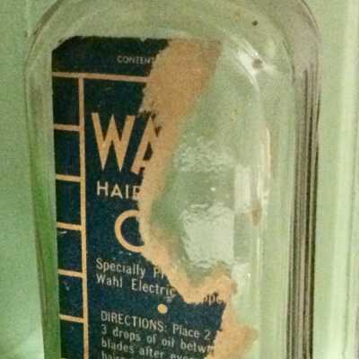 Clear Glass Bottle with Lubricant for electric hair cutting blades