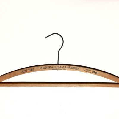 Wooden advertising hanger of the Alameda Steam Laundry, prior 1970