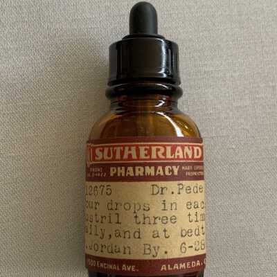 Dark Amber bottle of medication prescribed by Dr. Pedersen, 1952
