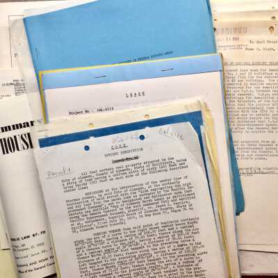 Documents relating to transfer of war housing, 1954