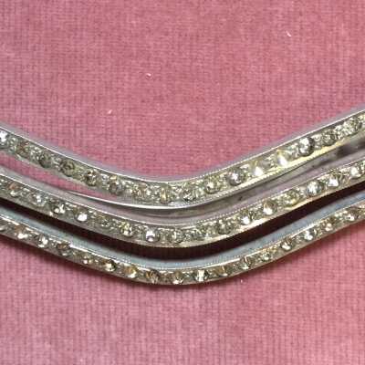Metal belt buckle with rhinestones in pseudo art deco style, c. 1930s