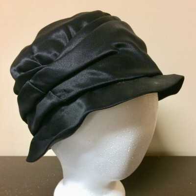 Black satin cloche style hat by Avalon, San Francisco, c. 1930