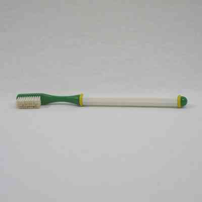 Green and White Toothbrush