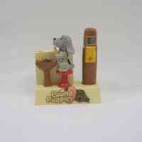 2004.68.1a,.1b Pound Puppies Battery Toothbrush Holder and Pound Puppies Batter Toothbrush Stand Untagged Front.jpg
