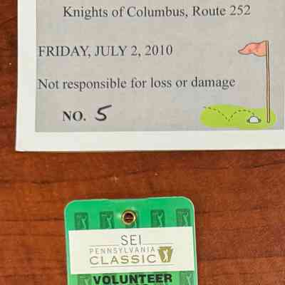 Golf tournament volunteer pass; parking pass
