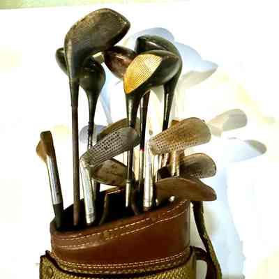 Antique golf clubs and golf bag
