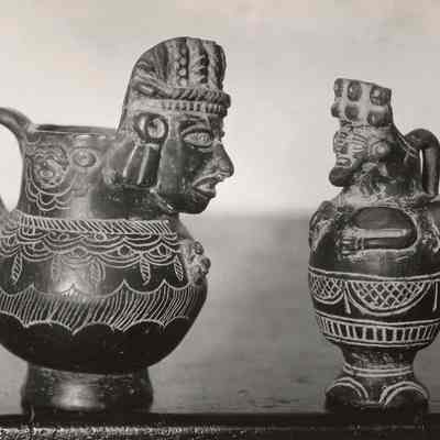 Two Carved Pitchers