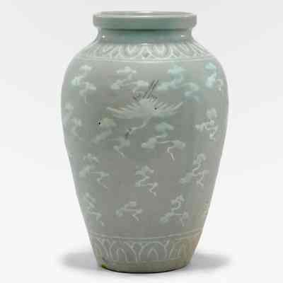 Jar with Cranes and Clouds Design