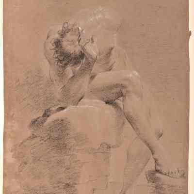 Male Nude Seated among Rocks
