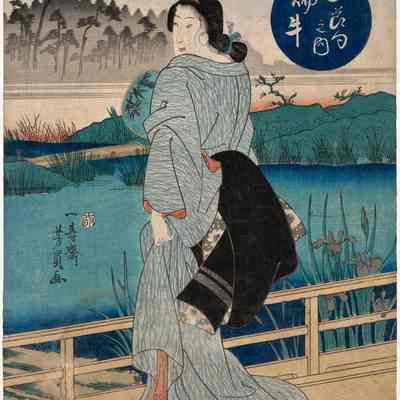 Woman Standing on a Bridge