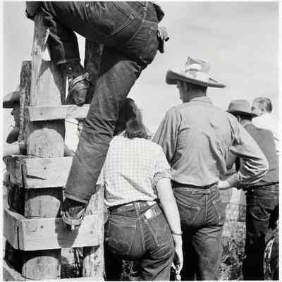 Dudes and cowboy from Quarter Circle U Ranch at Crow Indian fair. Crow Agency, Montana