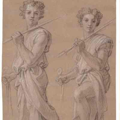 Two Young Men Carrying Poles