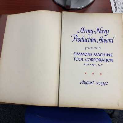 Excerpt from the Simmons Army-Navy Production Award Scrapbook: Original owned by Simmons - One of about 40 pages total