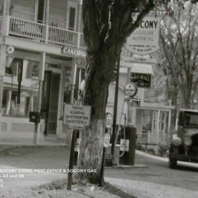 C. A. Nash Grocery Store & Gas Station, Rte. 43 & 66, (ca. 1928-31) Close-up 1: Two interesting road signs: a Troy/Albany/Stephentown/Pittsfield distance mileage marker and a rte. 43 & 66 highway sign.  Such cast-iron "roadside marker-style" highway signs were likely manufactured at the Walton Foundry, now Catskill Castings and have completely disappeared from NY's roadways, with perhaps a few surviving either in private or museum collections.  However, the basic design remains in use for historic markers.
