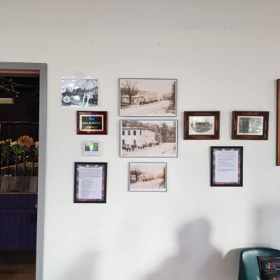 Leaving Faith Mills Then and Now: Additional then and now display of the recent reenactment of a historic photograph of Faith Mills workers leaving work upon completion of their daily shift.
