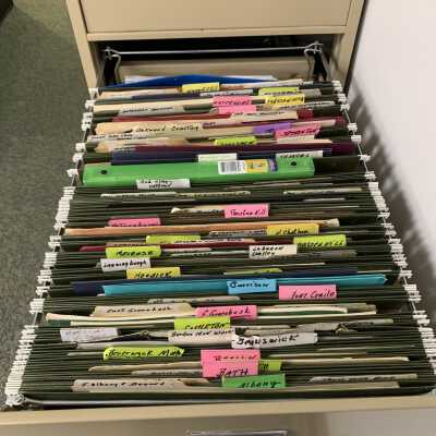 SLHS File Cabinet 2 - Drawer 2: Stores various histories and articles regarding towns, municipalities, and other historic societies surrounding the Town of Sand Lake.