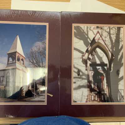 Sand Lake Center for the Arts and Former Town Hall and church photos: One copy each of matted and frameable photographs of the Sand Lake Center for the Arts and Former Town Hall and church that were likely taken in the late 20th century.
