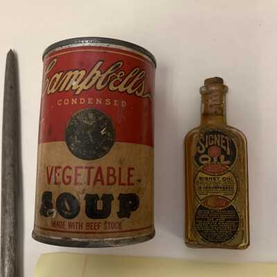 Campbell's Soup can and Signet Oil bottle close-up