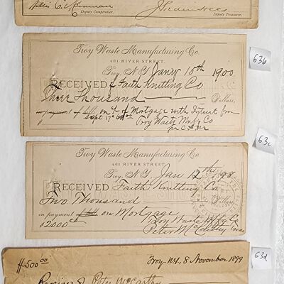 Doc # 63 Payment Receipts 1897-03-17 FPO: For payments from or to the State of NY, Faith Knitting Company, Troy Waste Manufacturing Company, and Wynantskill Improvement Association (WIA) for tax, mortgage, and assessment costs. Set of 4 separate both printed and handwritten receipts.  All are approximately quarter-page sized ranging in dates from 1987 to 1900 and from $75 to $3,000 in value. The WIA receipt notes a $500 payment for assessments against the McConike property per a resolution passed by the WIA and is signed by WIA Treasurer Nicolas A. Gable.